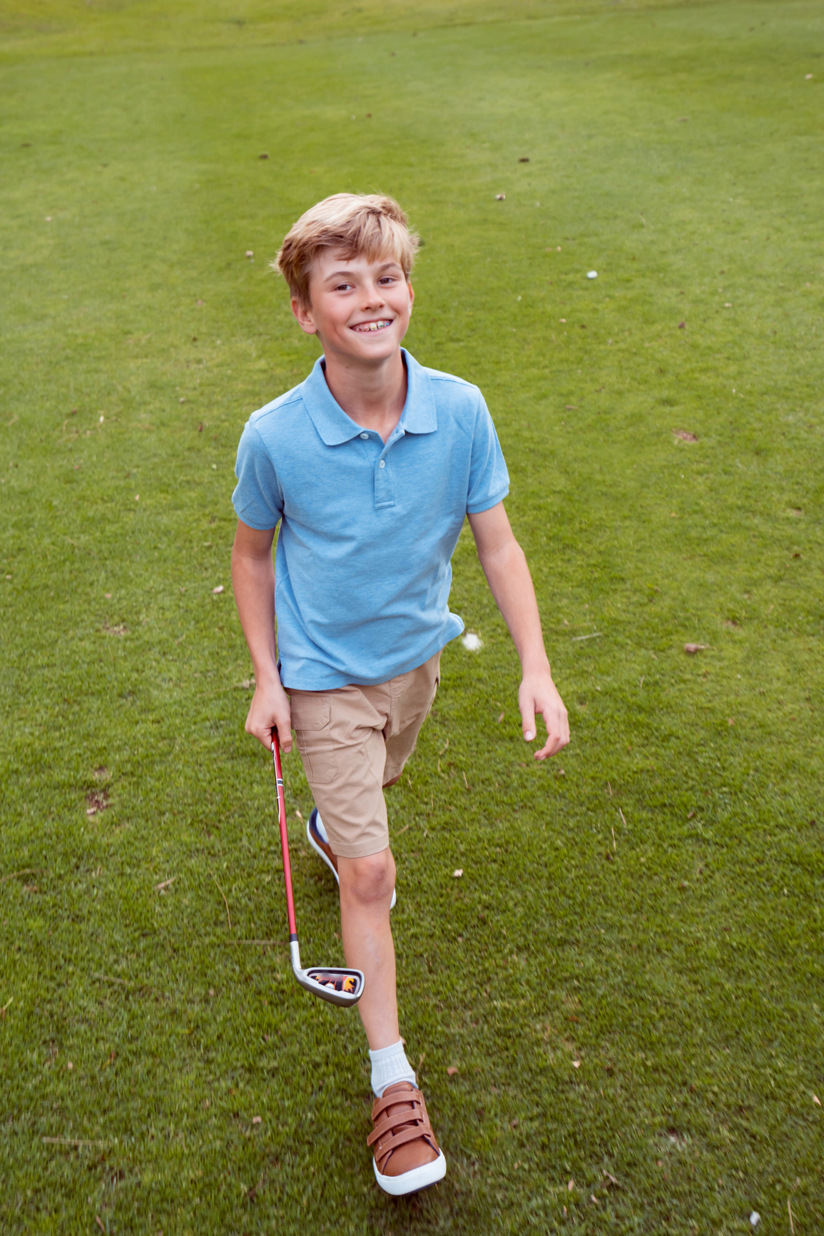 9 Year Old  Boy Golfing